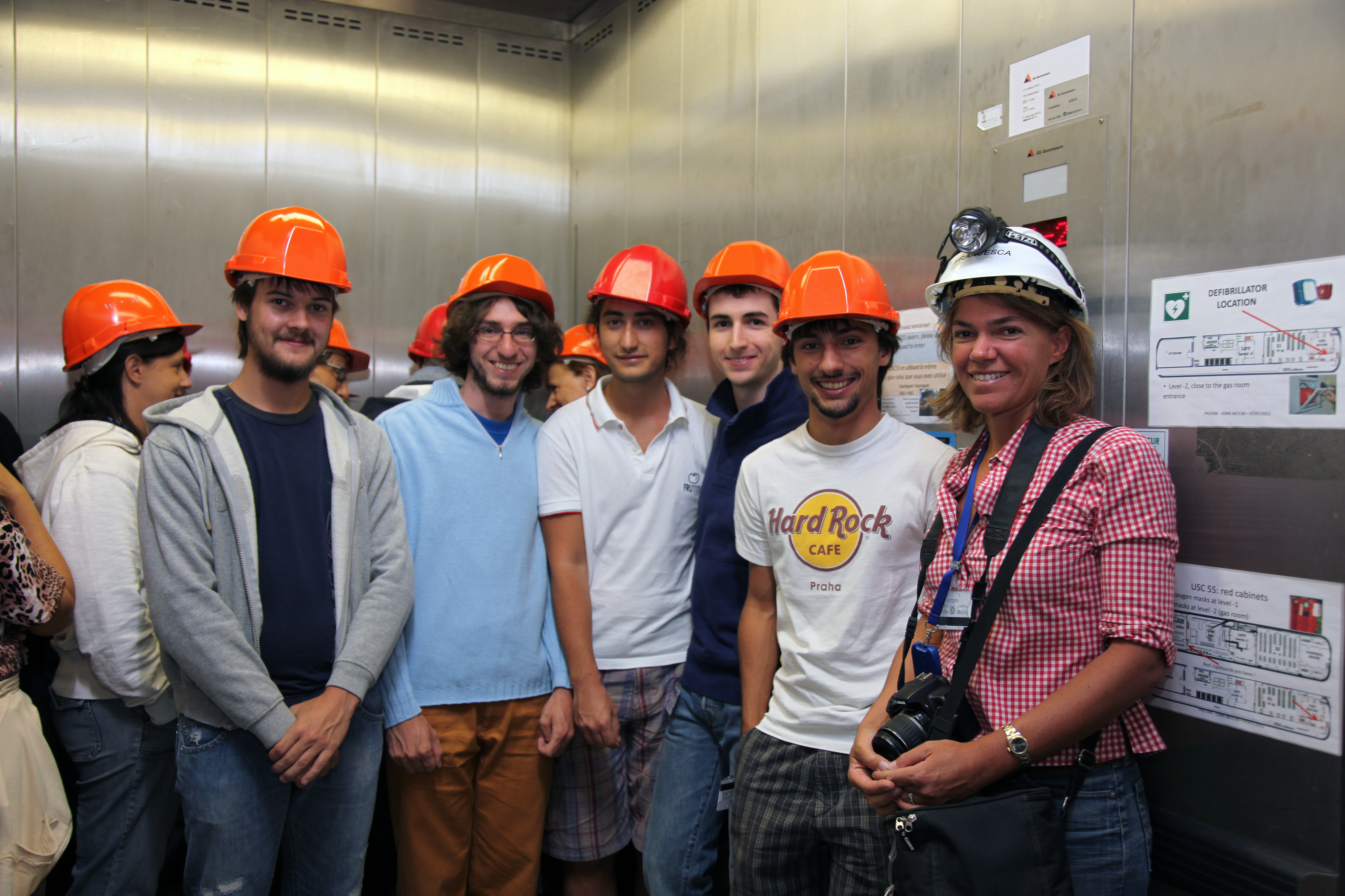 The students, taking the lift to the CMS cavern, located 100 m below the surface