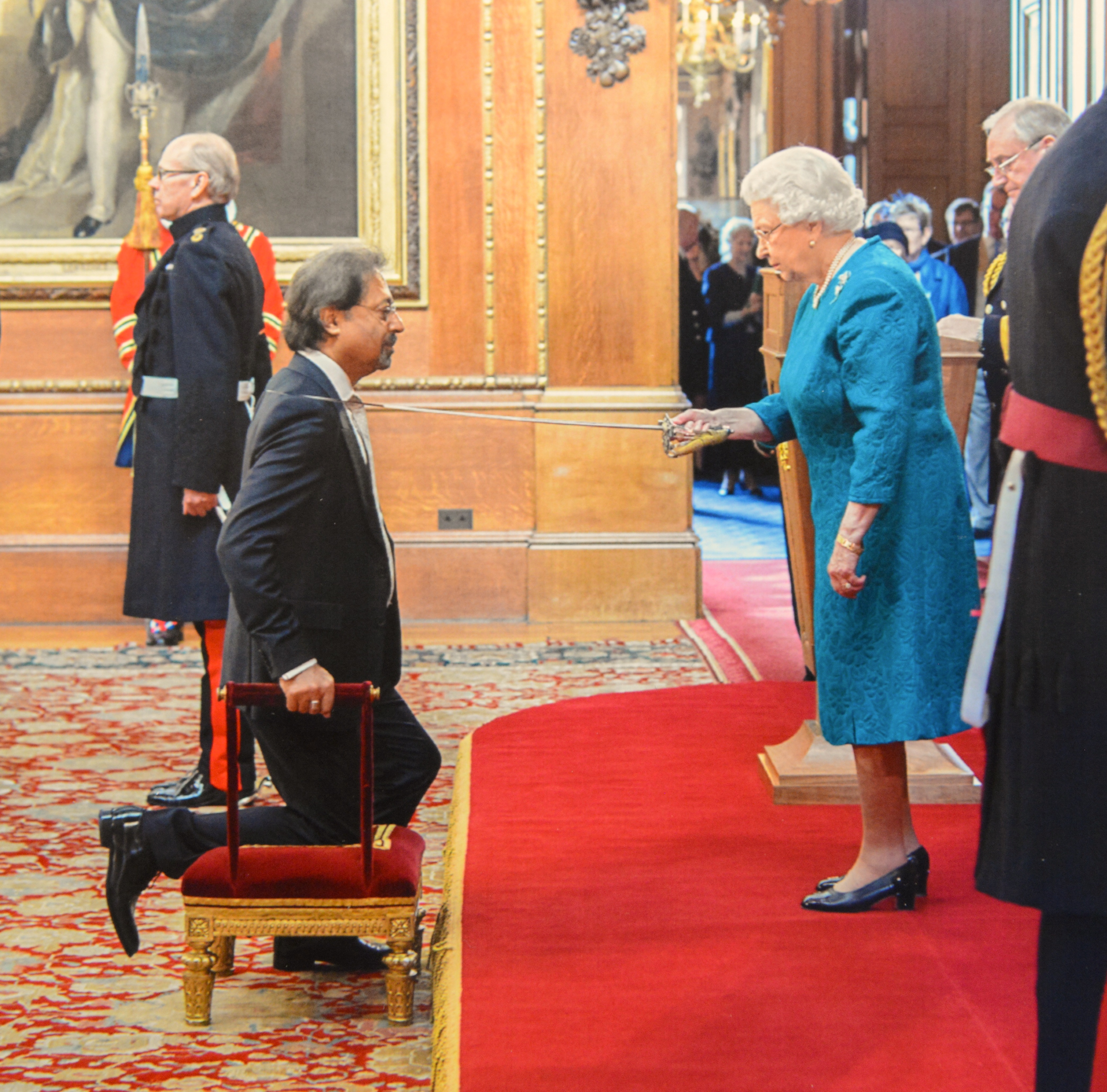 Jim receiving the accolade