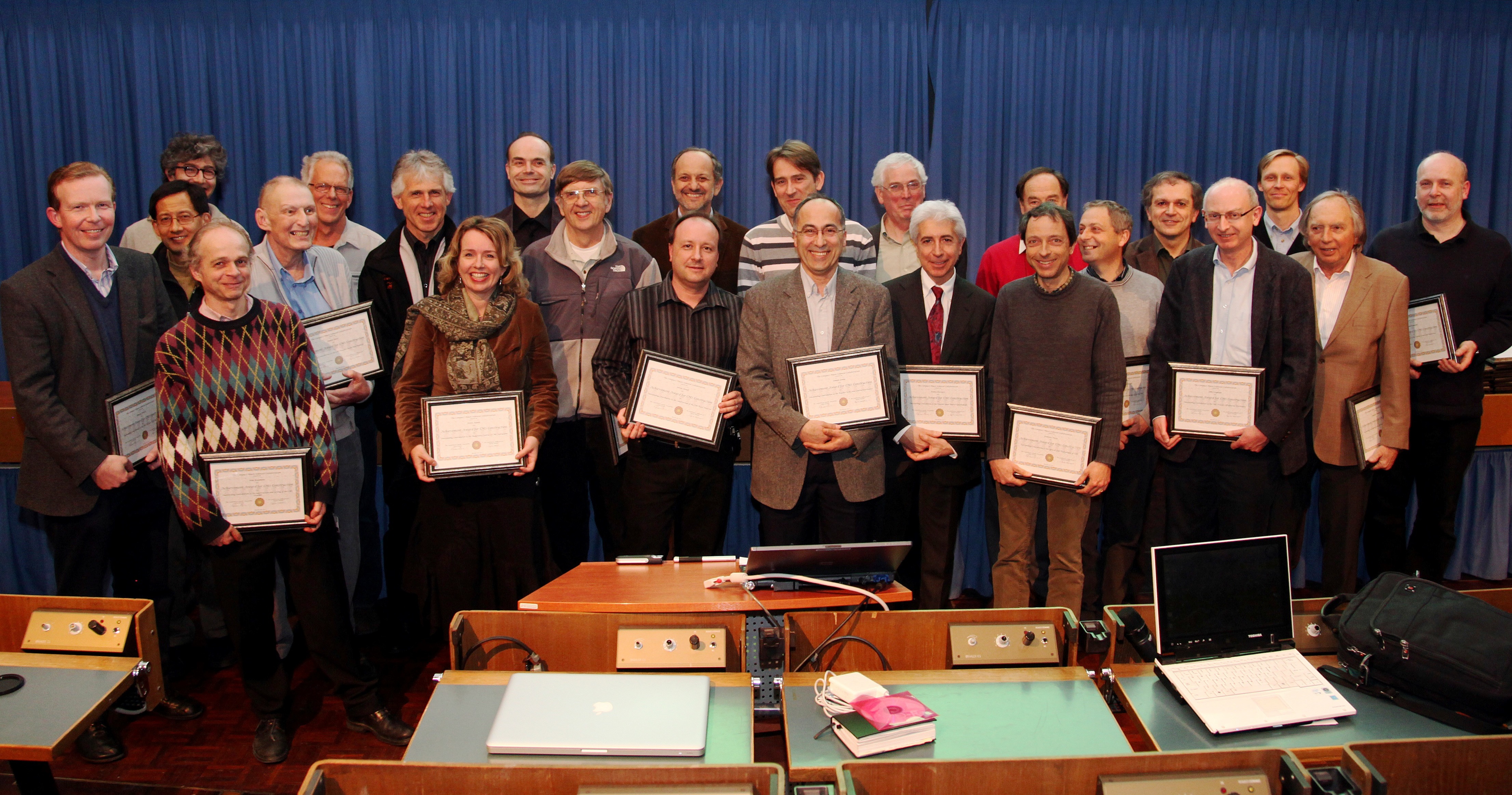 The awardees in the Main Auditorium, award certificates in hand