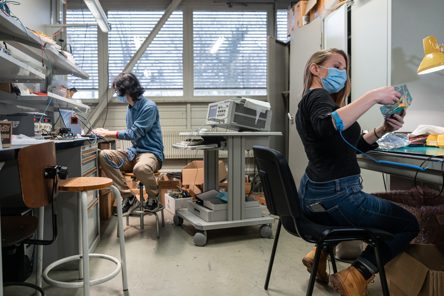 Team working in the HCAL ngCCM Laboratory. Sebastian (Xuli) Yan, Left. Grace Cummings, Right. Credit: S.J. Hertzog, CERN